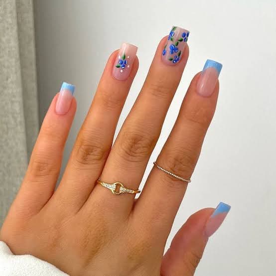 Blue floral French tip on square nails with botanical nail art